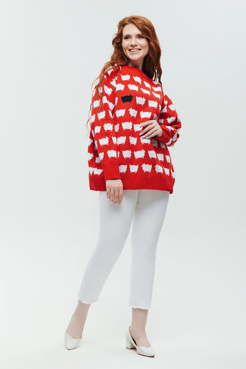 Czerwony sweter symbolizujący niezależność i odwagę